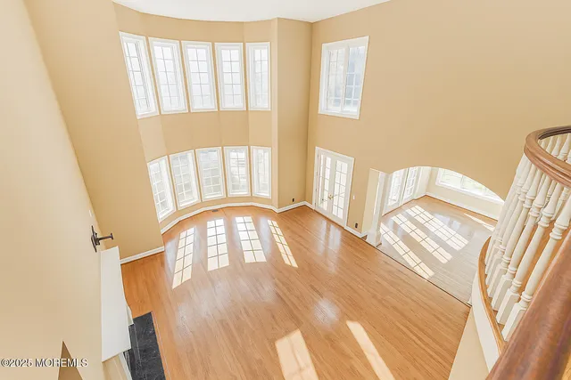 a view of an entryway with a floor to ceiling window