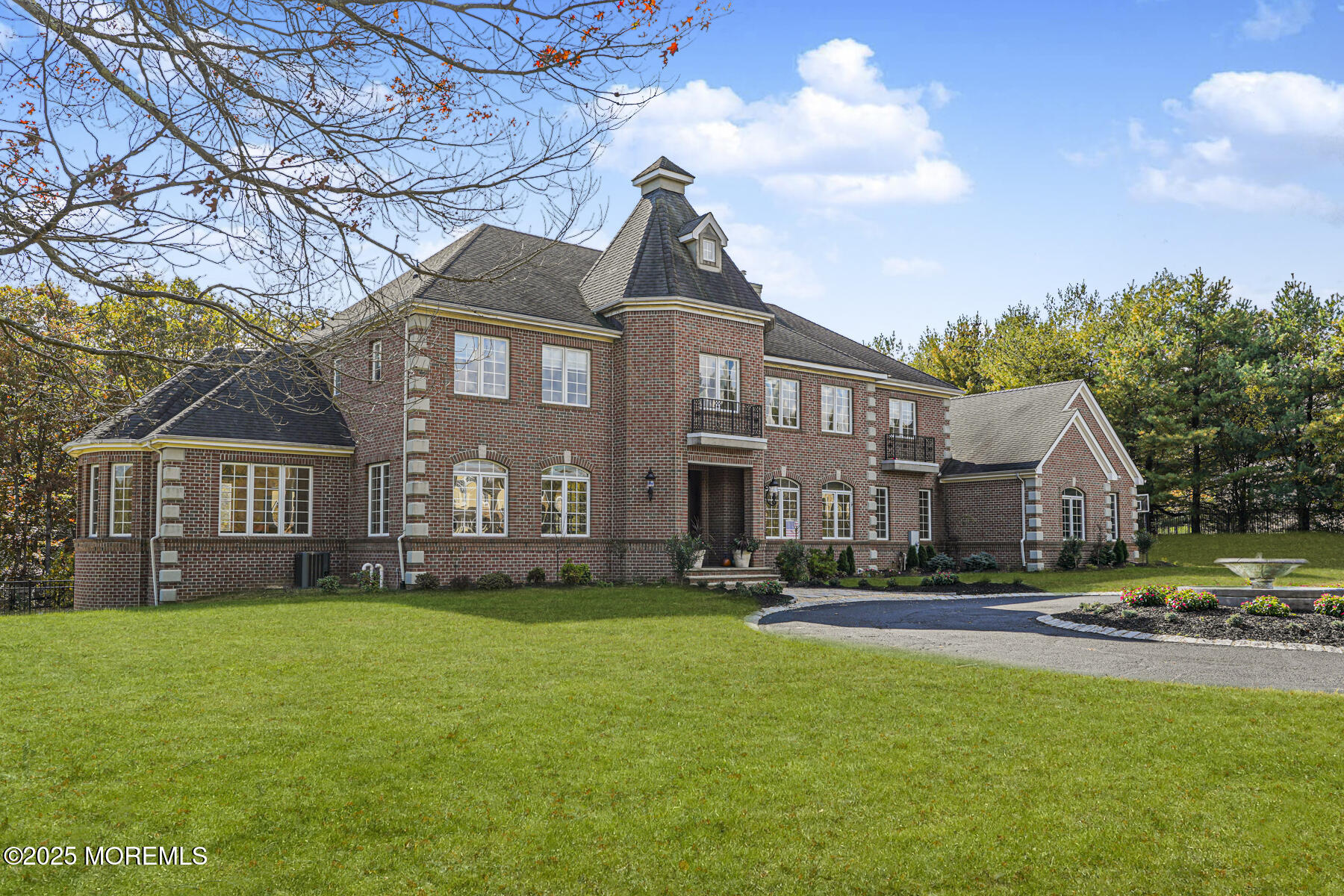 97 Stone Hill Road Colts Neck, NJ 07722 - Photo 2 of 51 a front view of a house with a yard