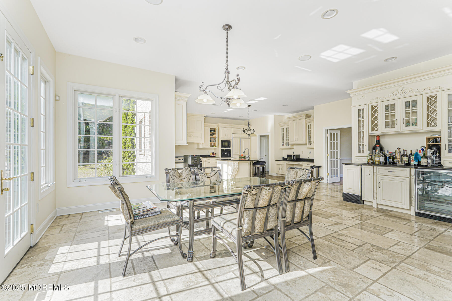 97 Stone Hill Road Colts Neck, NJ 07722 - Photo 21 of 51 a view of a dining room with furniture and windows