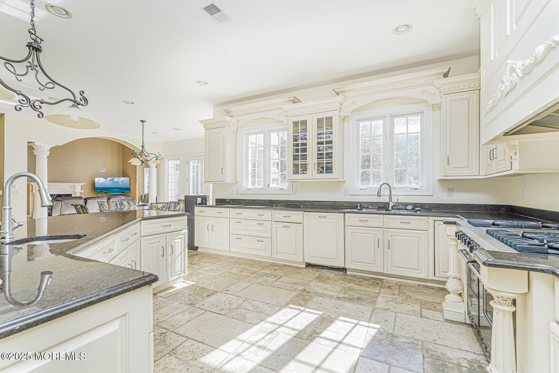 97 Stone Hill Road Colts Neck, NJ 07722 - Photo 26 of 51 a kitchen with stainless steel appliances granite countertop a sink stove and cabinets