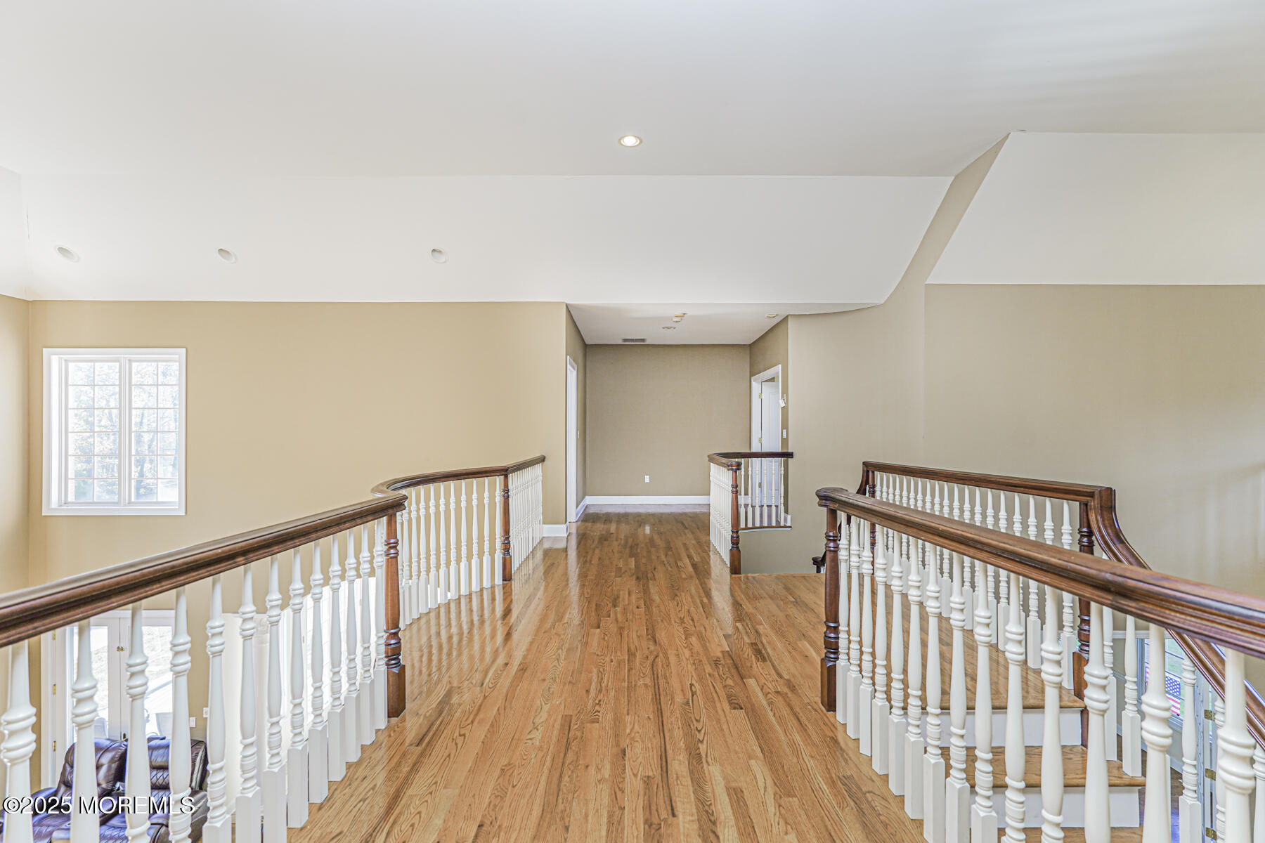 97 Stone Hill Road Colts Neck, NJ 07722 - Photo 29 of 51 a view of hallway with wooden floor