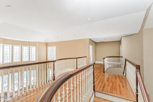 a view of livingroom with hardwood floor and a fireplace