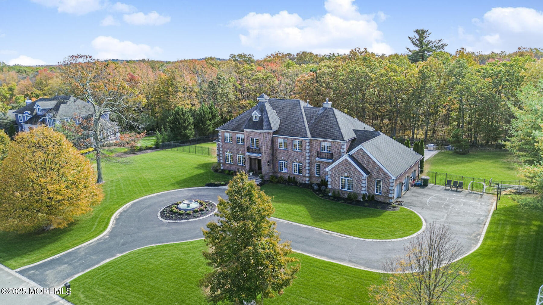 97 Stone Hill Road Colts Neck, NJ 07722 - Photo 3 of 51 an aerial view of a house with a garden