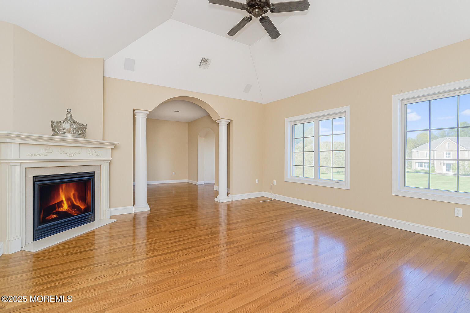 97 Stone Hill Road Colts Neck, NJ 07722 - Photo 34 of 51 wooden floor fireplace and windows in an empty room