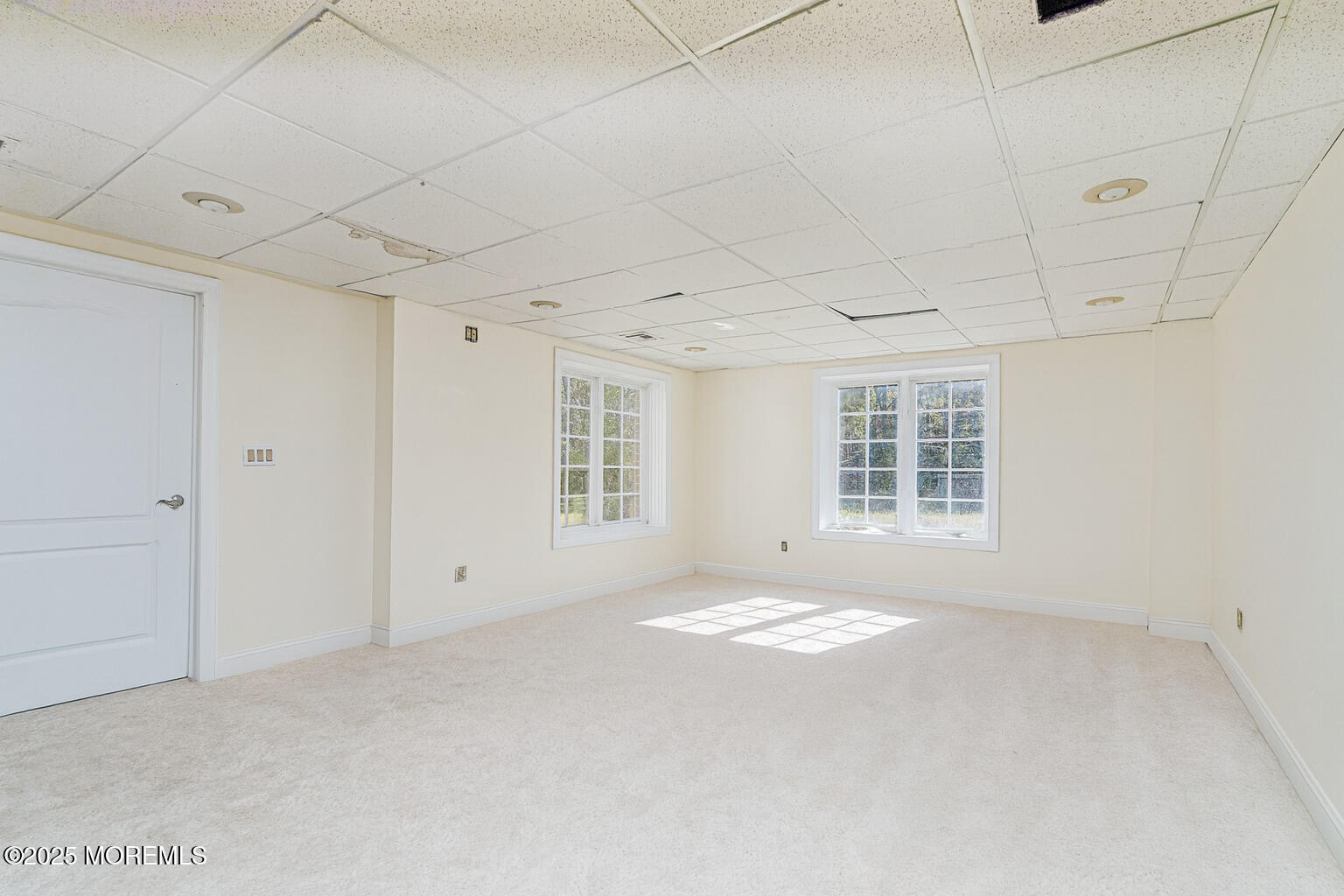 97 Stone Hill Road Colts Neck, NJ 07722 - Photo 50 of 51 a view of an empty room with a window