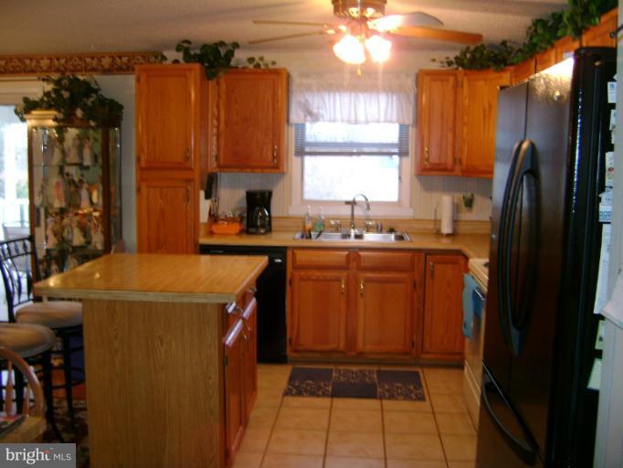 2215 Wilhelm Avenue Rosedale, MD 21237 - Photo 1 of 12 a utility room with dryer and washer