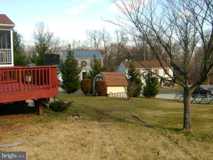 2215 Wilhelm Avenue Rosedale, MD 21237 - Photo 3 of 12 a view of a backyard