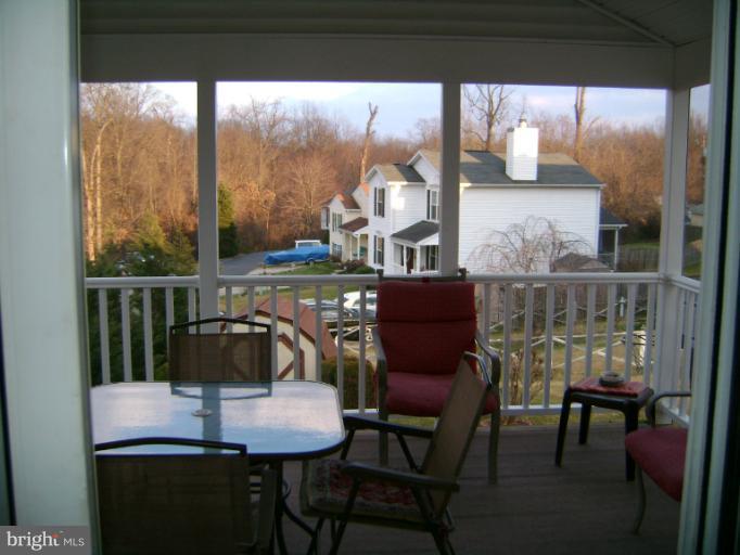2215 Wilhelm Avenue Rosedale, MD 21237 - Photo 9 of 12 a view of a dining room with furniture window and outside view