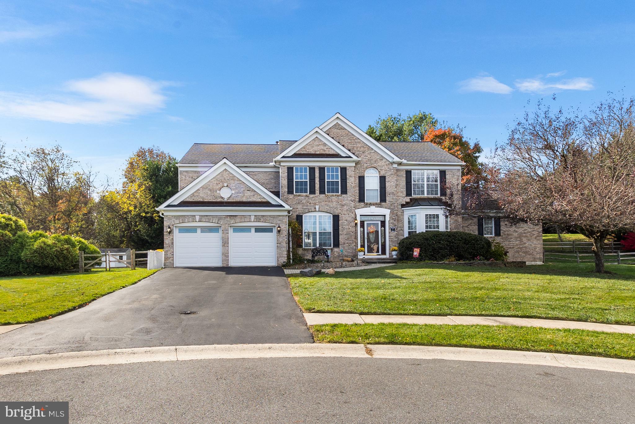8 Peacock Place Newark, DE 19711 - Photo 2 of 70 a view of a house with a big yard and large trees
