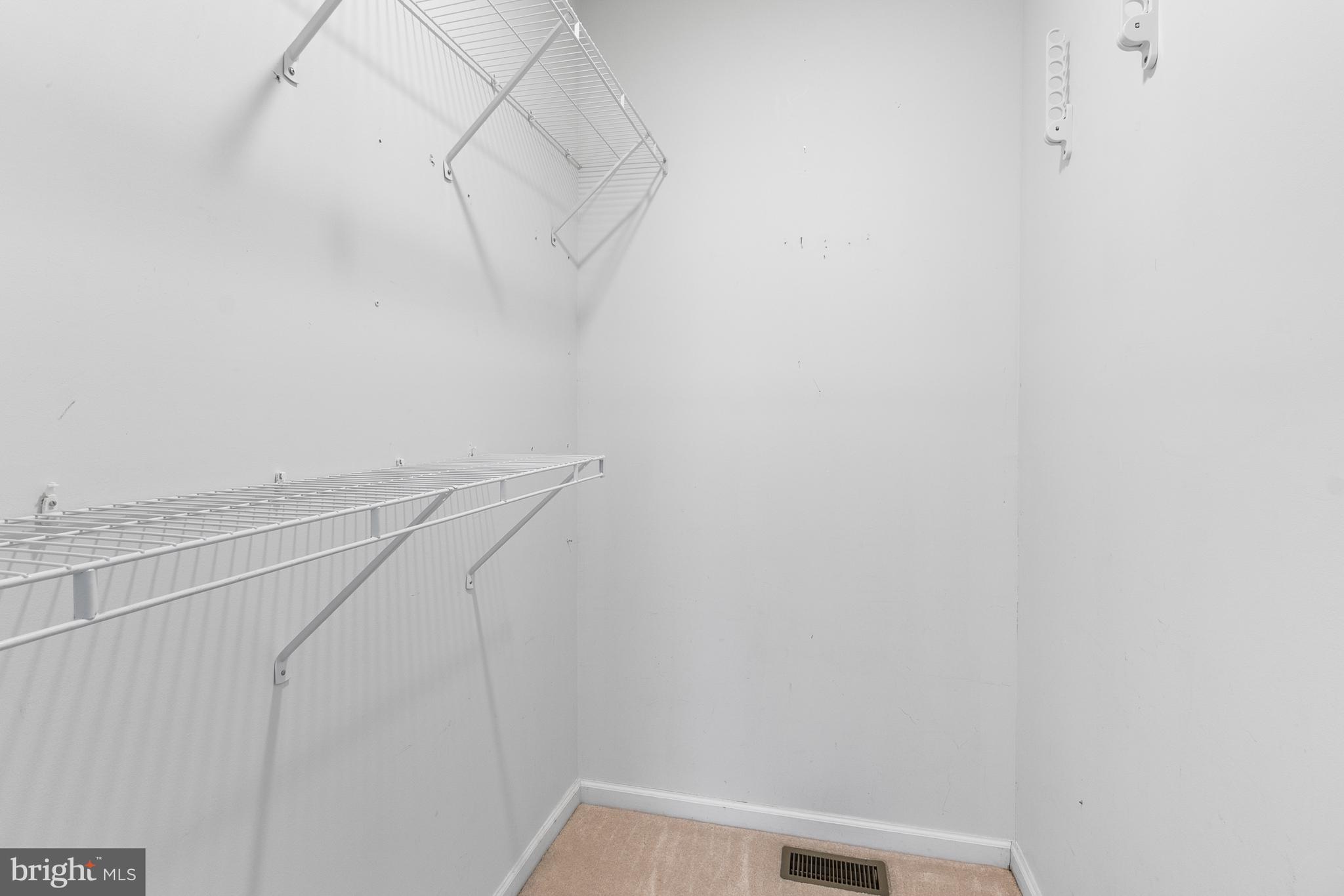 8 Peacock Place Newark, DE 19711 - Photo 37 of 70 a view of small space with racks on the wall