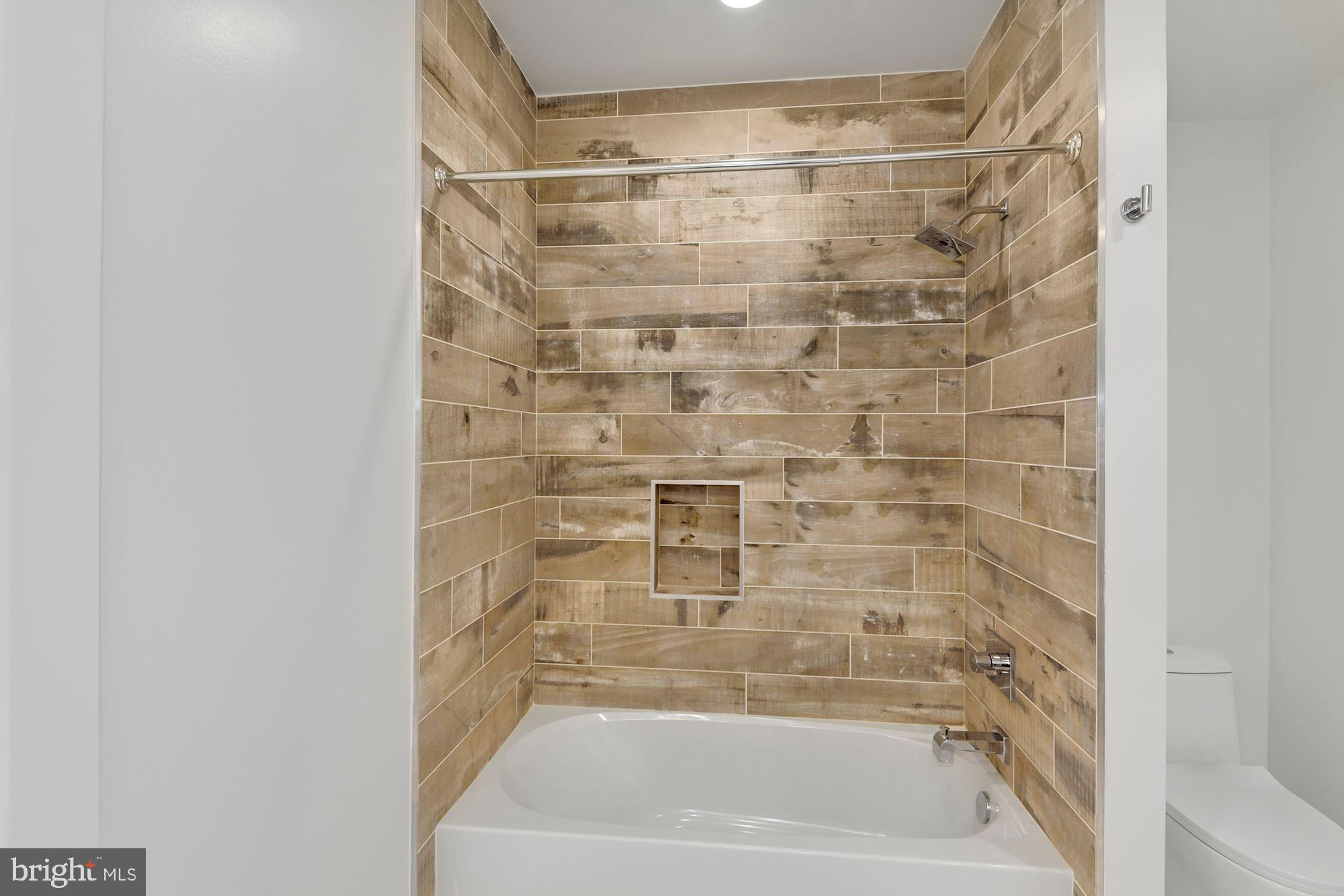 2009 E Street Northeast, Unit 4 Washington, DC 20002 - Photo 39 of 76 Both tub/shower combo and separate shower