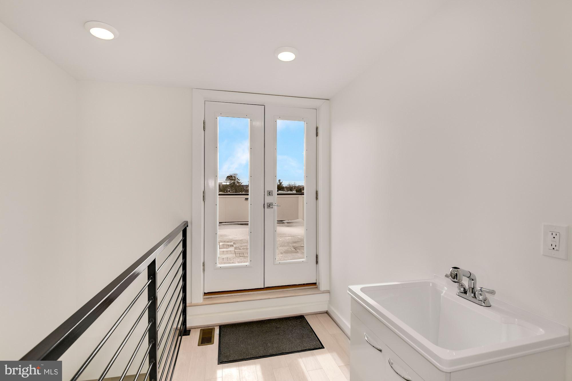 2009 E Street Northeast, Unit 4 Washington, DC 20002 - Photo 48 of 76 Top floor loft area opens to...