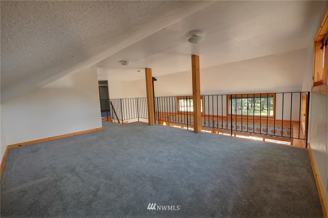 137 Jason Lucas Road Methow, WA 98834 - Photo 22 of 36 a view of a room with stairs