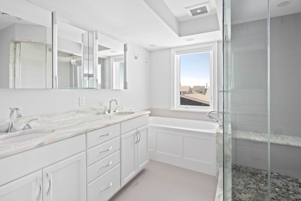 12 Monitor Road Marshfield, MA 02050 - Photo 22 of 38 a bathroom with a granite countertop sink mirror and