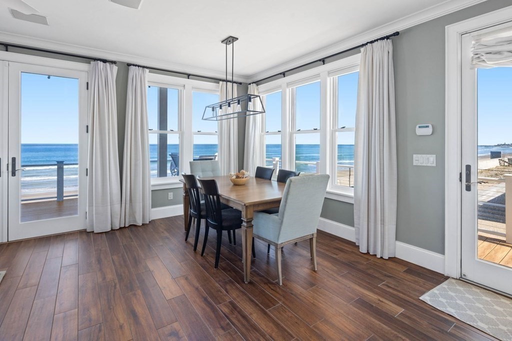 12 Monitor Road Marshfield, MA 02050 - Photo 10 of 38 a view of a dining room with furniture window and wooden floor