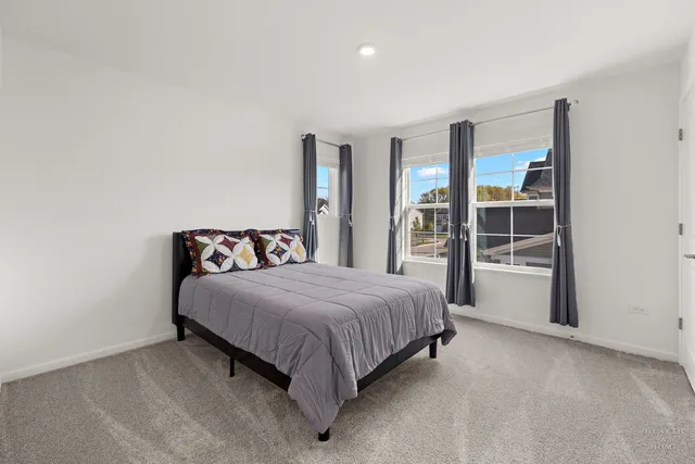 a bedroom with a bed and a closet