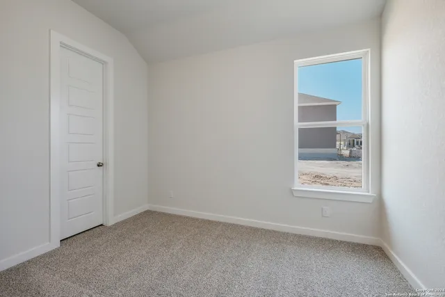 a bathroom with a sink double vanity and a mirror