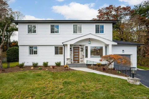 a view of house with outdoor space