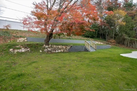 a view of a park with large trees