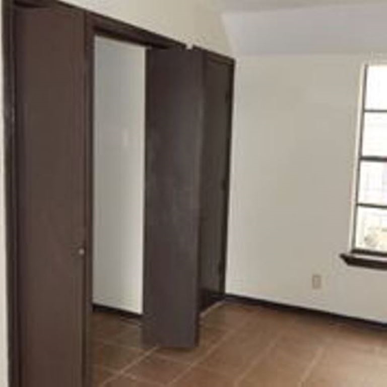 3202 Chacota Street Laredo, TX 78046 - Photo 11 of 11 a view of an empty room with windows