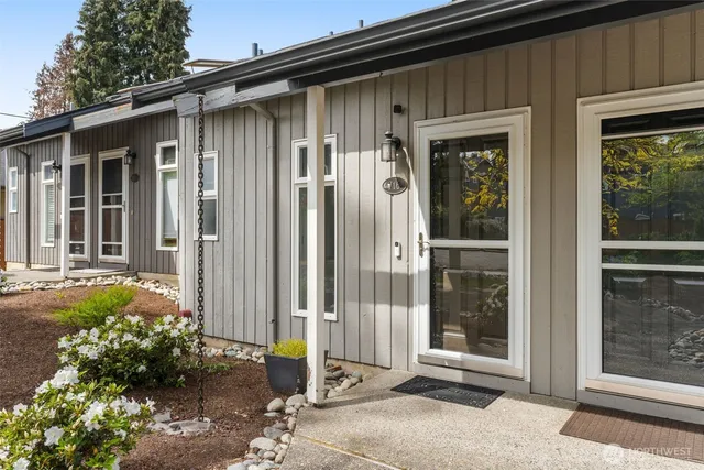 a view of a chair and table in the balcony
