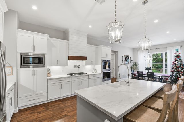 a workspace with furniture window and wooden floor