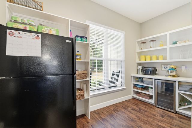 a view of a storage and utility room