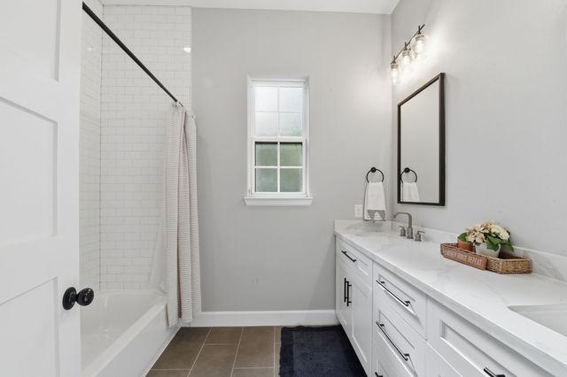 a bedroom with a bed and closet