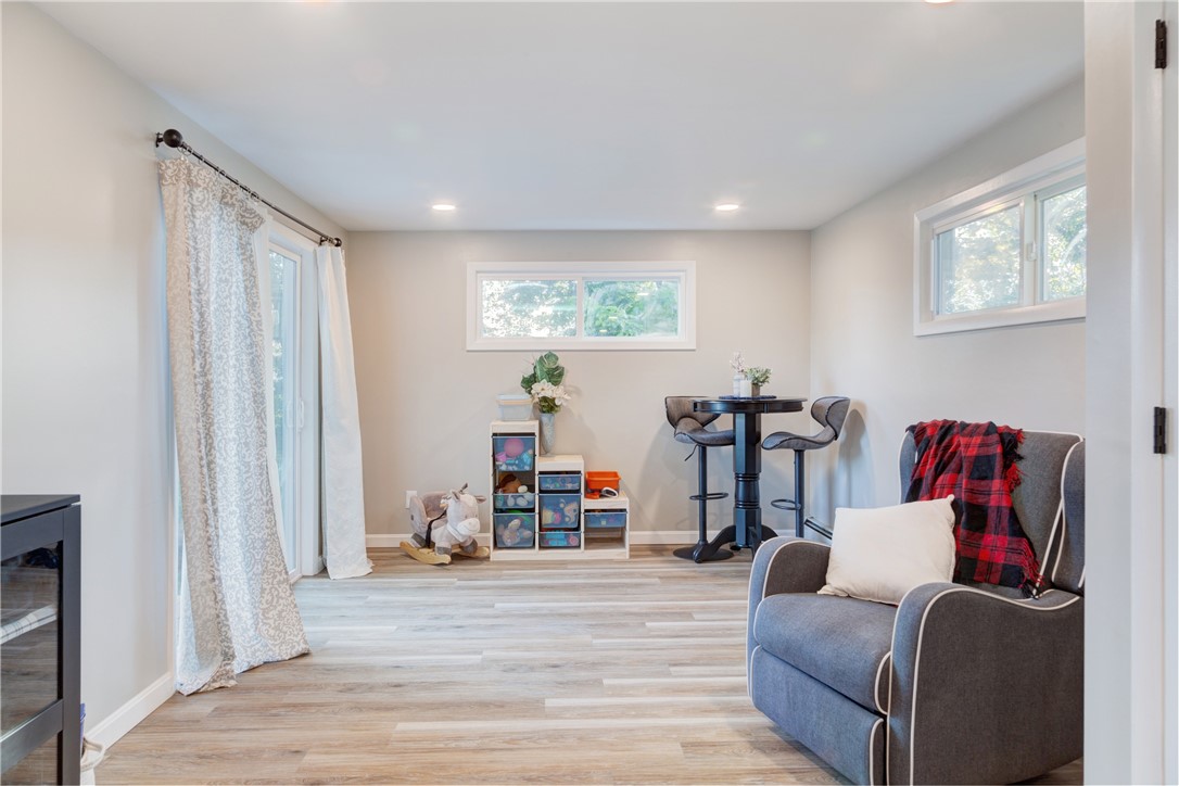 214 Mapleton Street Cranston, RI 02910 - Photo 15 of 39 Family room with sliders out to deck