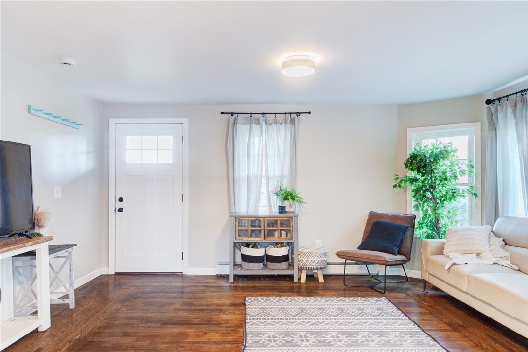 214 Mapleton Street Cranston, RI 02910 - Photo 5 of 39 Front entrance into living room.