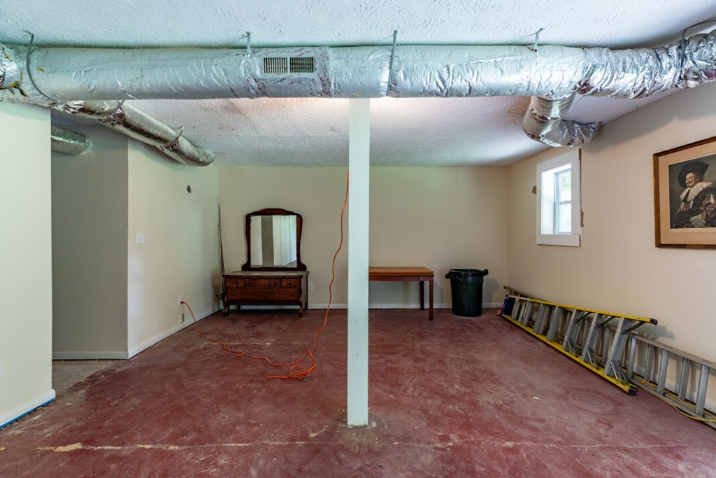 411 Piney Acres Road Blue Ridge, GA 30513 - Photo 32 of 72 a view of a livingroom with furniture