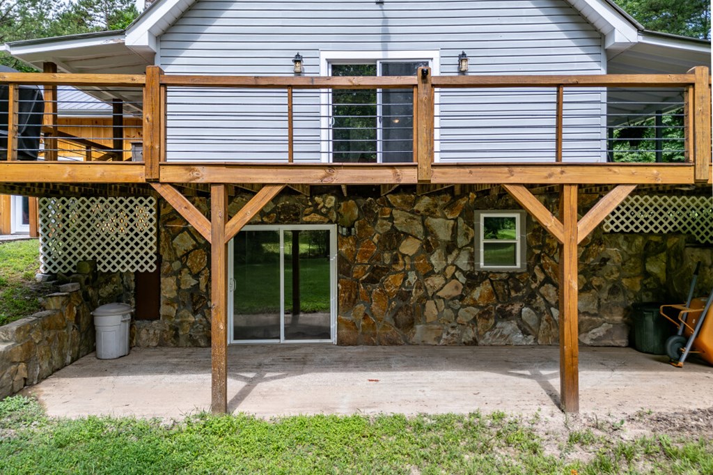 411 Piney Acres Road Blue Ridge, GA 30513 - Photo 40 of 72 a view of a house with a yard and wooden fence