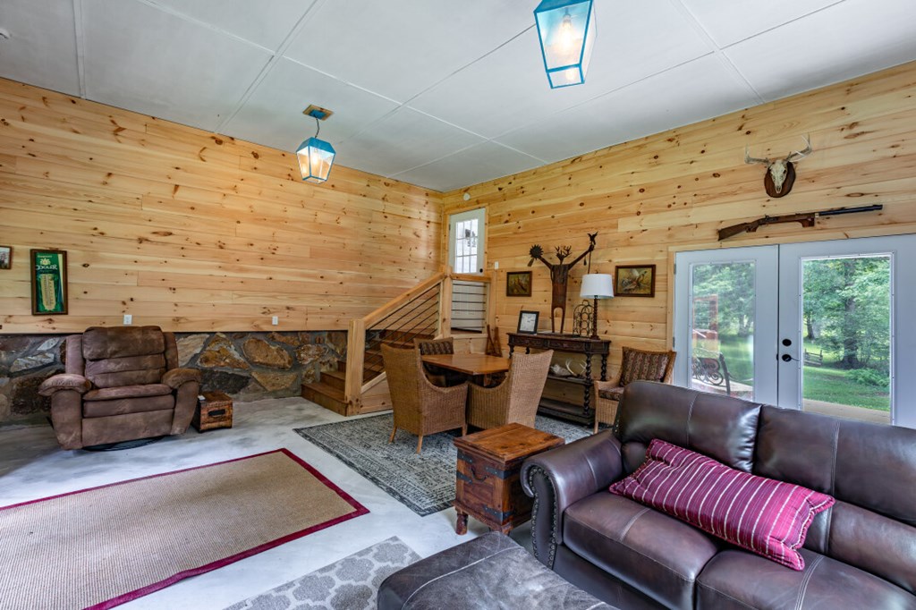 411 Piney Acres Road Blue Ridge, GA 30513 - Photo 49 of 72 a living room with furniture