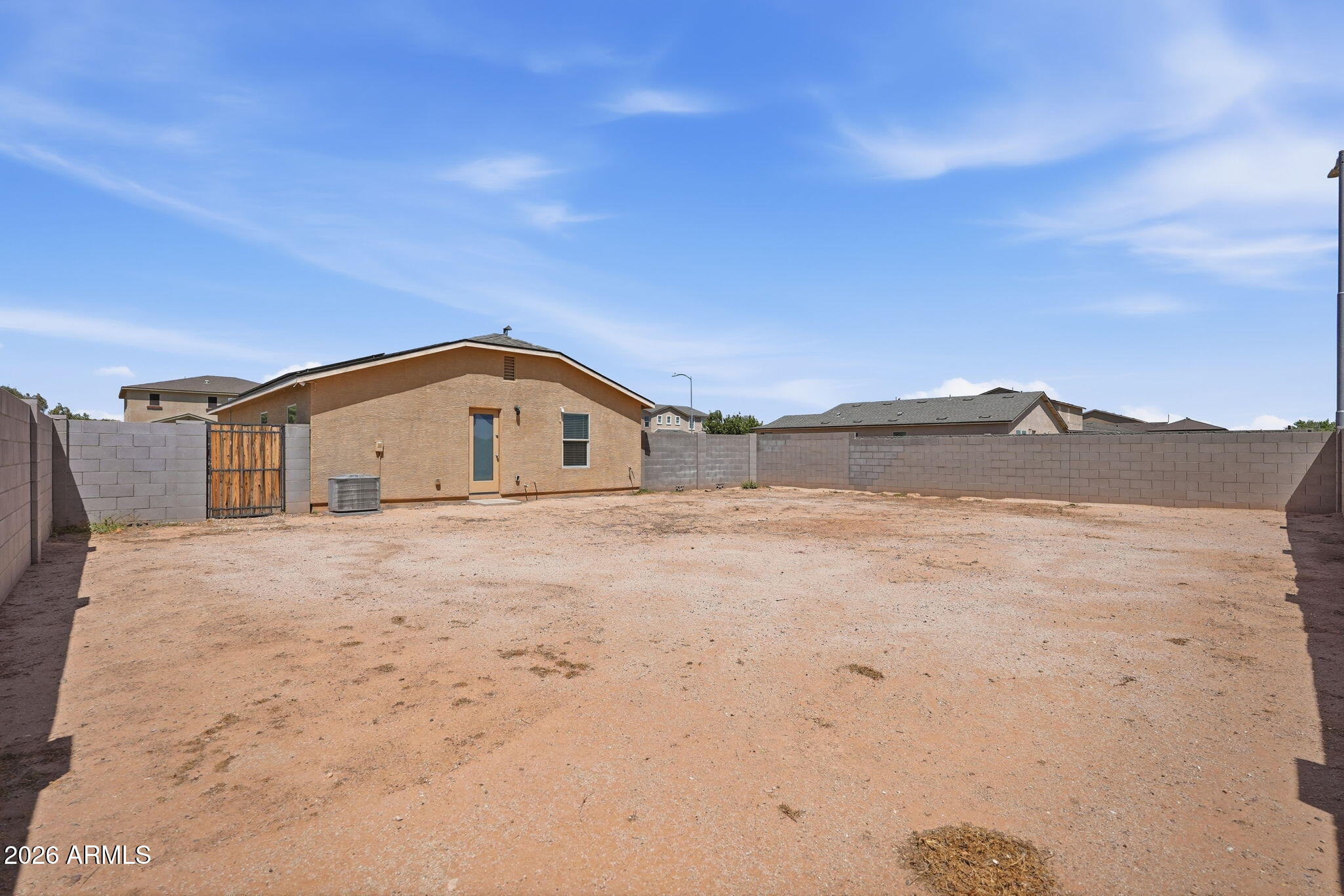 135 Watson Place Casa Grande, AZ 85122 - Photo 17 of 24 a view of big yard with an empty space