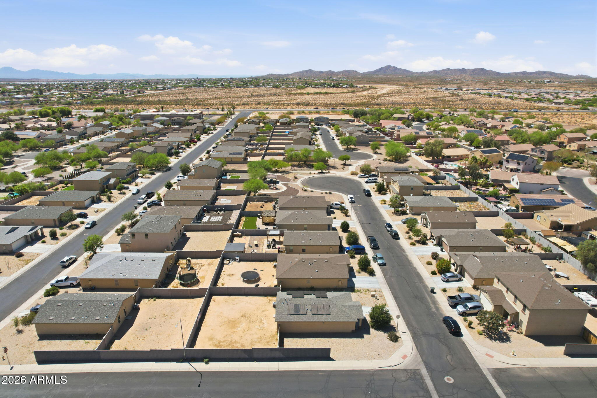 135 Watson Place Casa Grande, AZ 85122 - Photo 19 of 24 an aerial view of residential houses with outdoor space
