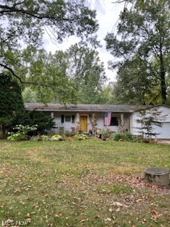 36091 Law Road Grafton, OH 44044 - Photo 1 of 1 Single story home with a front yard