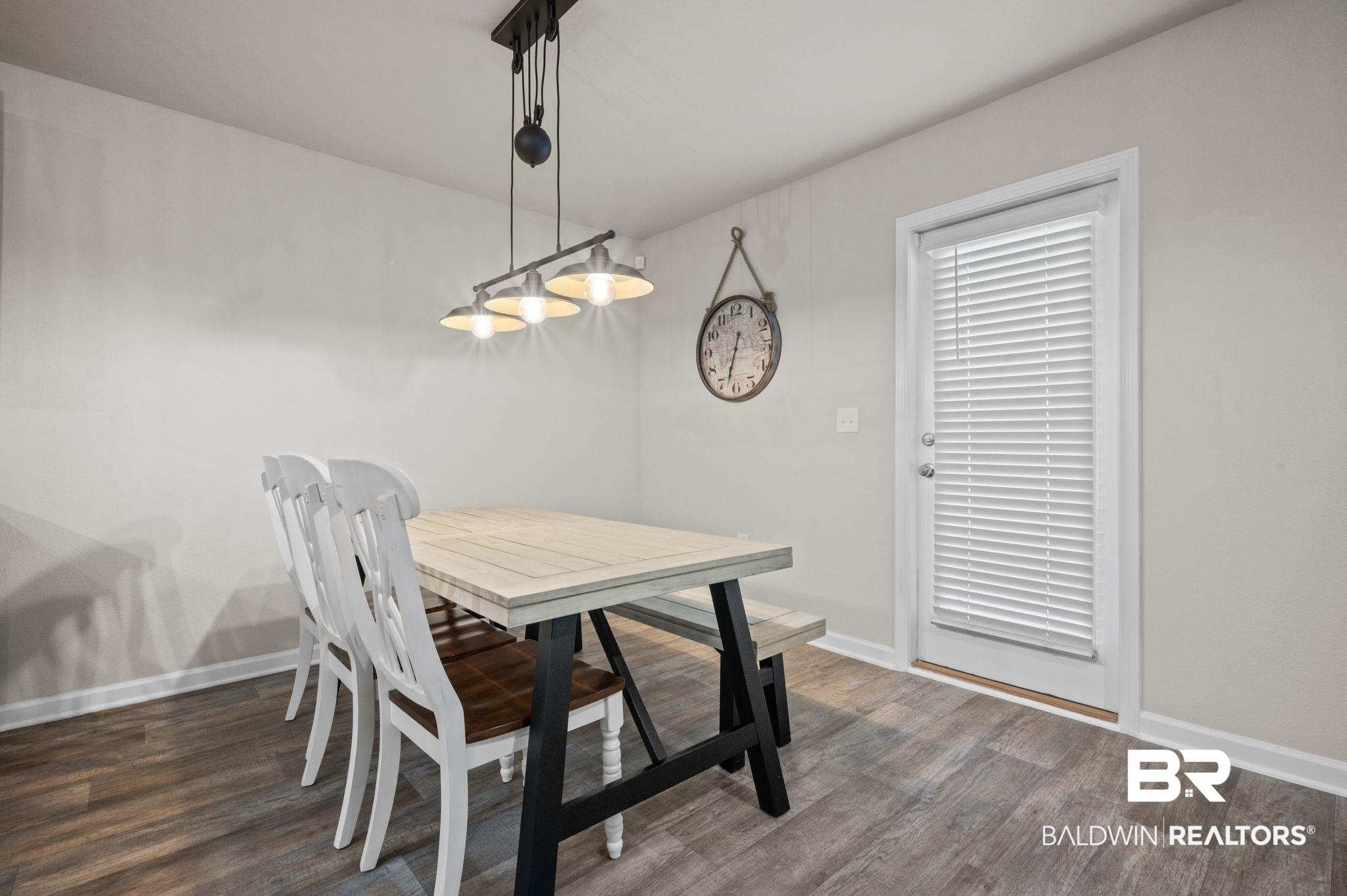 10306 Brodick Loop Spanish Fort, AL 36527 - Photo 13 of 35 Dining space featuring dark hardwood / wood-style floors