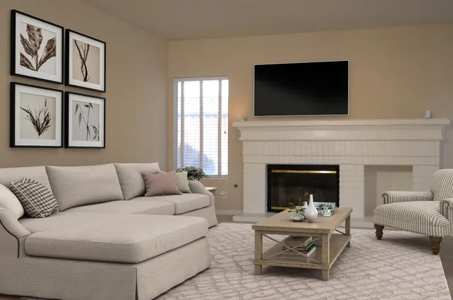 a living room with furniture and a fireplace