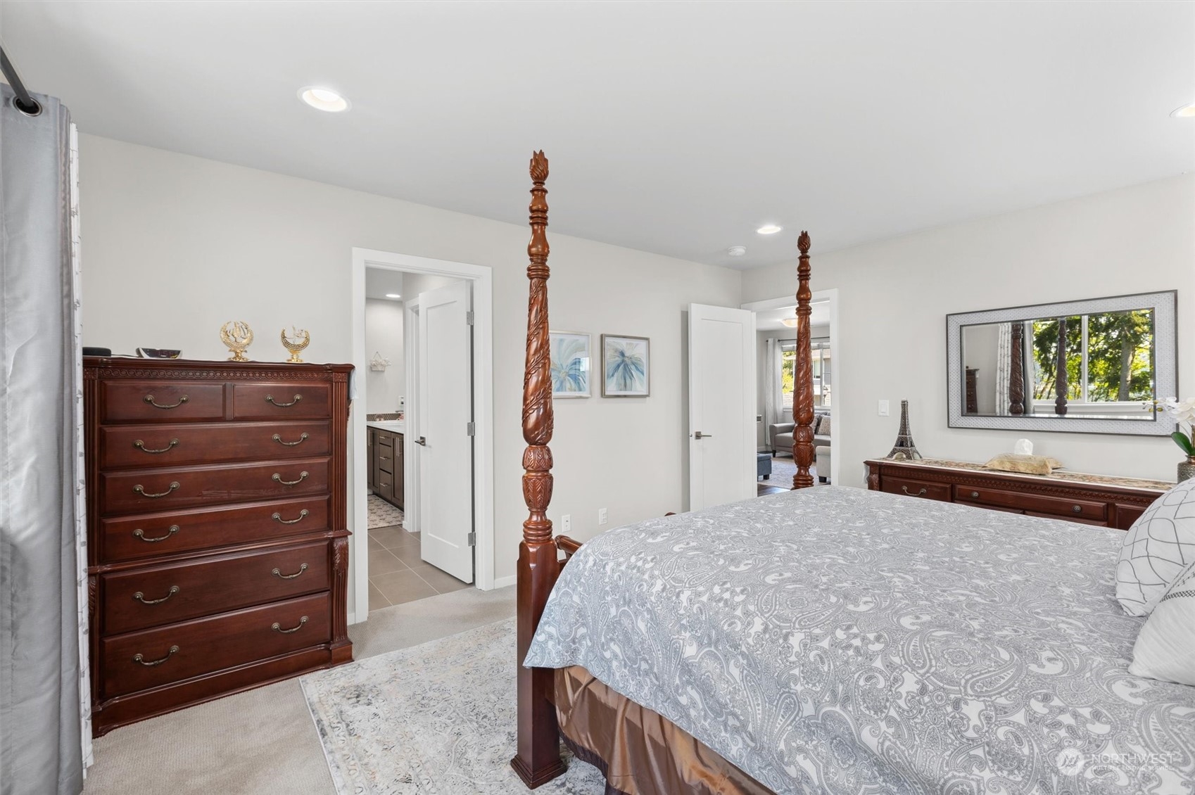 4765 Smithers Avenue South Renton, WA 98055 - Photo 18 of 38 a bedroom with a bed and a dresser
