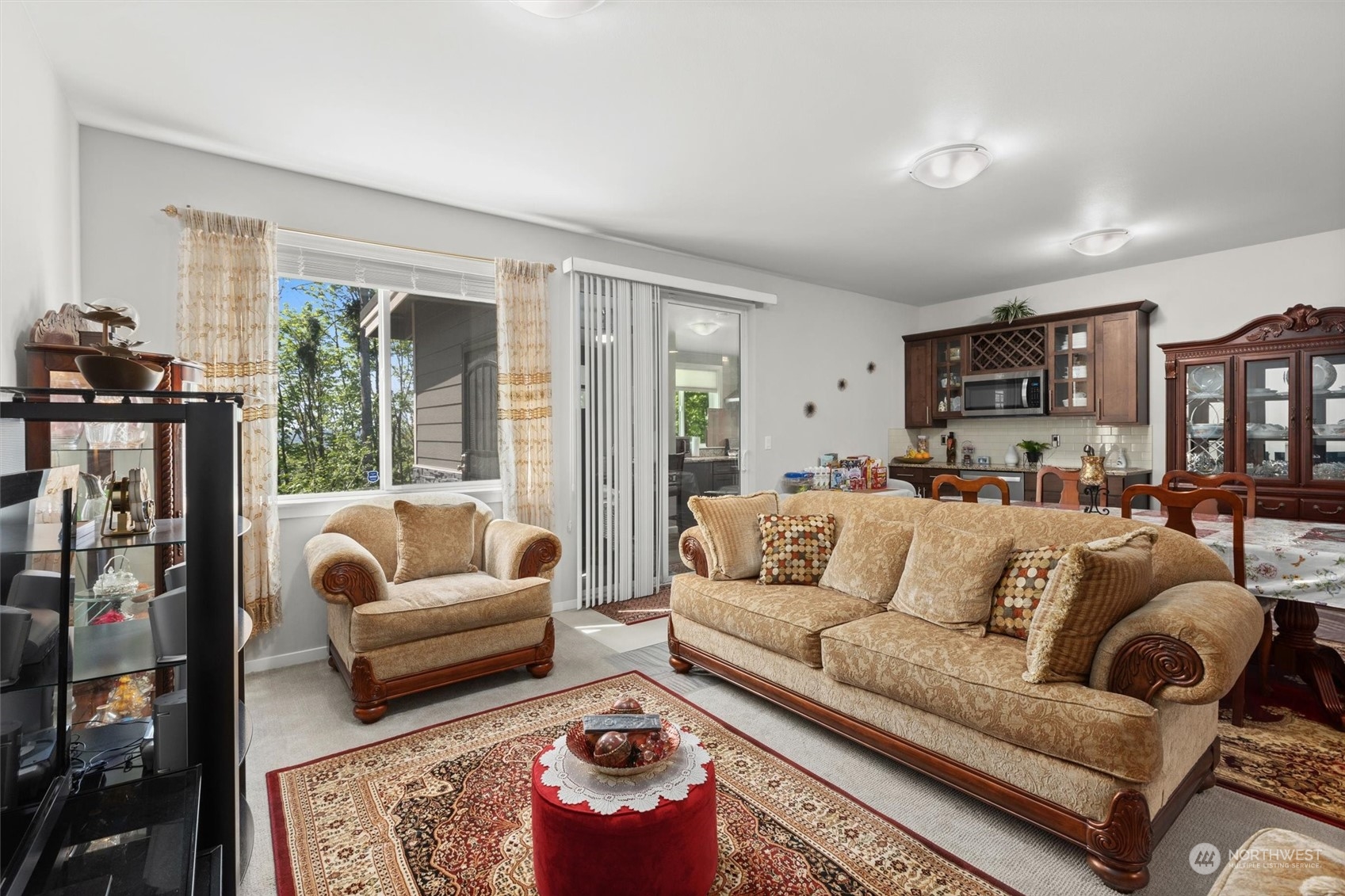 4765 Smithers Avenue South Renton, WA 98055 - Photo 27 of 38 a living room with furniture fireplace and a large window