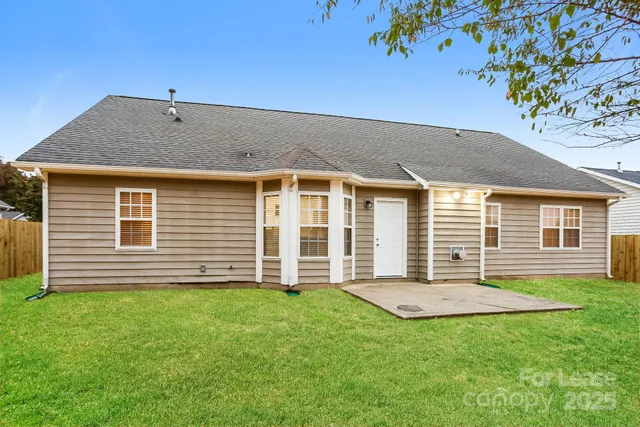 a house view with a garden space