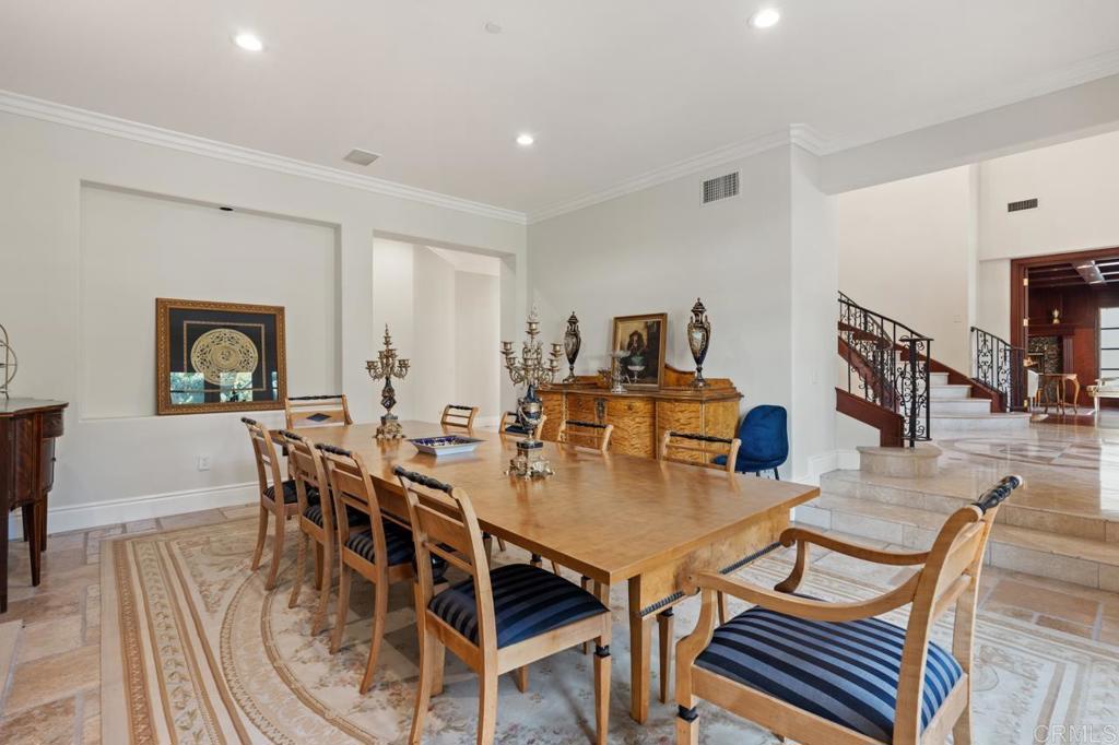 6773 Poco Lago Rancho Santa Fe, CA 92067 - Photo 19 of 65 a view of a dining room with furniture