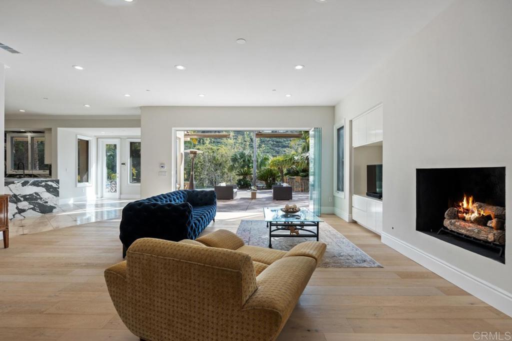 6773 Poco Lago Rancho Santa Fe, CA 92067 - Photo 27 of 65 a living room with furniture and a flat screen tv