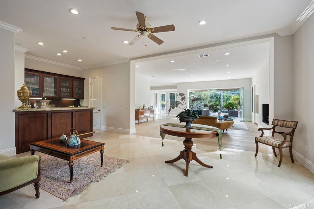 6773 Poco Lago Rancho Santa Fe, CA 92067 - Photo 31 of 65 a living room with furniture and a large window