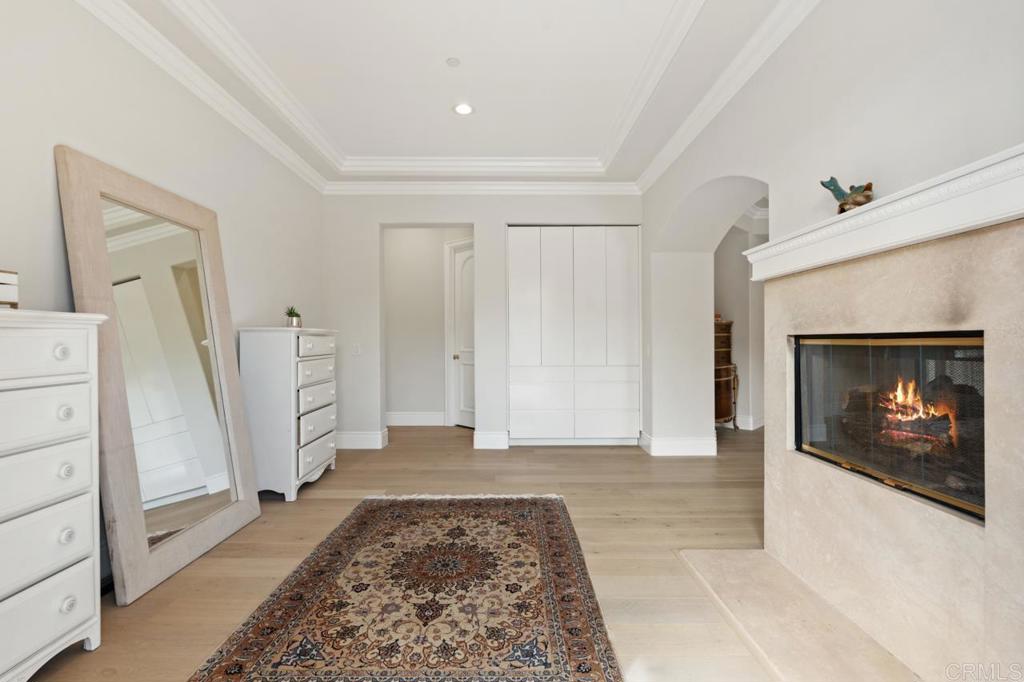 6773 Poco Lago Rancho Santa Fe, CA 92067 - Photo 35 of 65 a view of an empty room and fire place