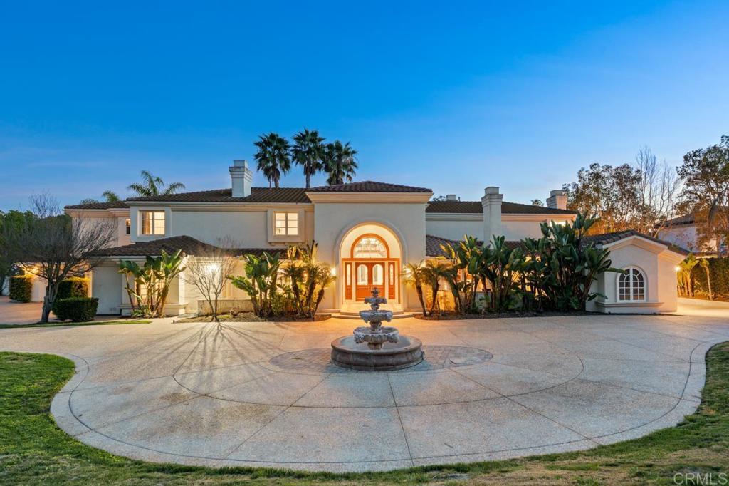 6773 Poco Lago Rancho Santa Fe, CA 92067 - Photo 4 of 65 a view of a house with a backyard