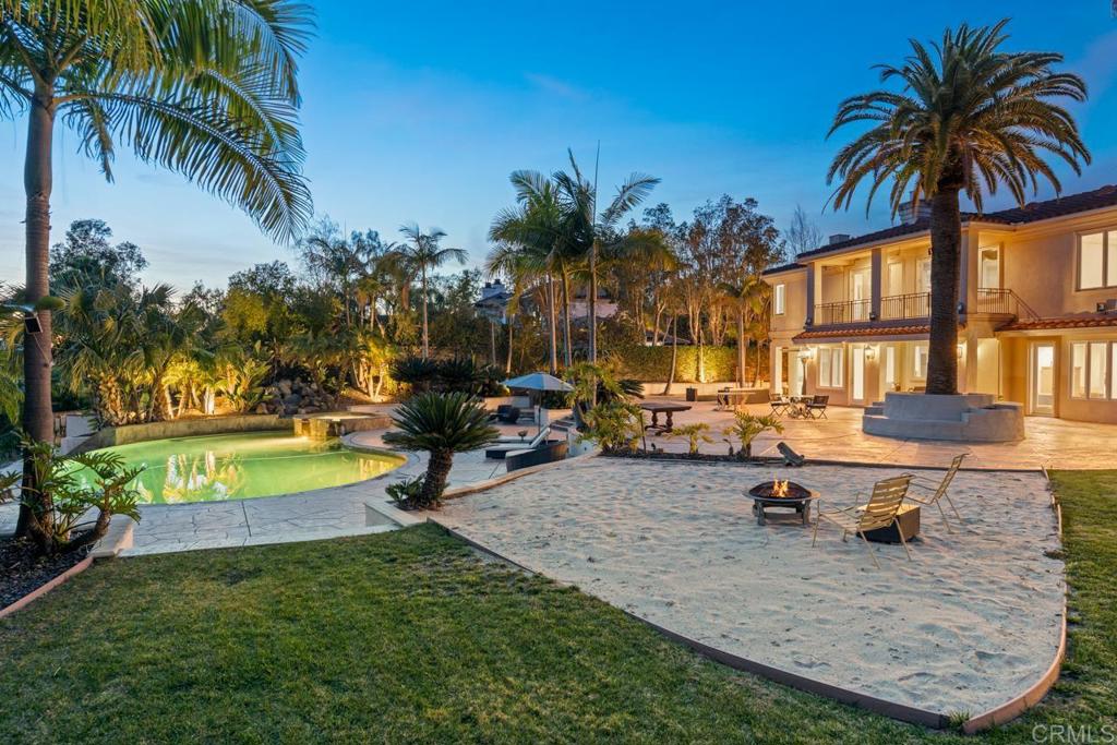 6773 Poco Lago Rancho Santa Fe, CA 92067 - Photo 46 of 65 a view of a house with swimming pool and sitting area
