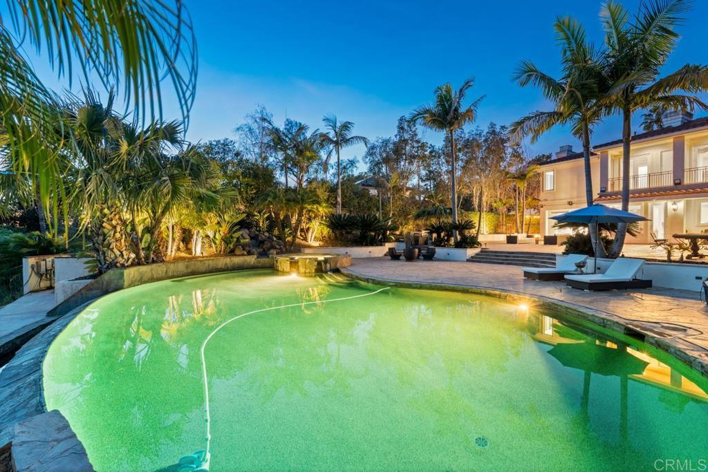 6773 Poco Lago Rancho Santa Fe, CA 92067 - Photo 48 of 65 a swimming pool with outdoor seating and yard
