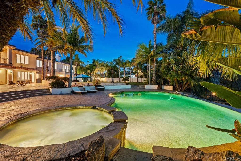 6773 Poco Lago Rancho Santa Fe, CA 92067 - Photo 50 of 65 a swimming pool with outdoor seating and yard