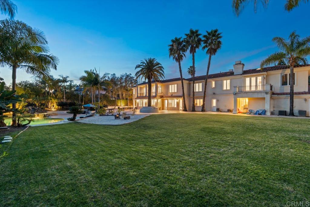 6773 Poco Lago Rancho Santa Fe, CA 92067 - Photo 52 of 65 a view of a house with a big yard